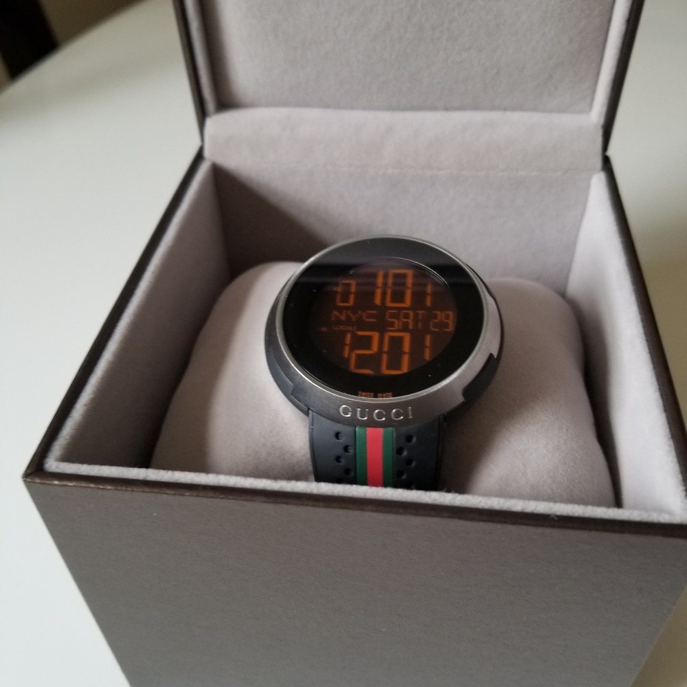 Gucci watch digital with box and tags.